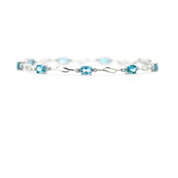14K. GOLD TENNIS BRACELET WITH BLUE TOPAZ & DIAMONDS (White Gold) - Picture 5 of 6